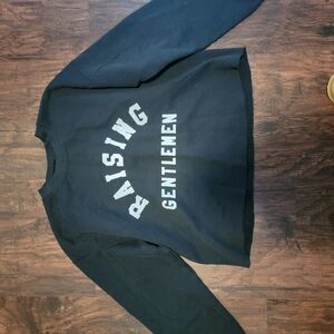 Black sweatshirt with white text and crew neck design